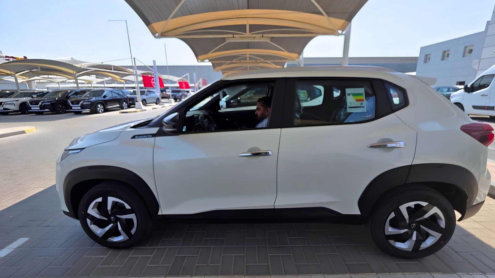 White Nissan Magnite from the 24 Cars Rental fleet